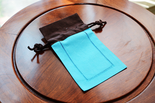 Hemstitch sachet bag, multi color, aqua & brown border